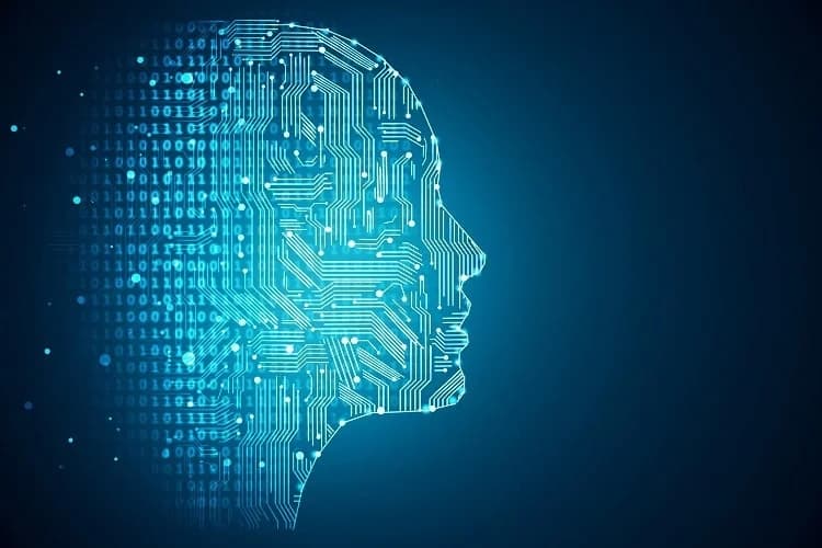Profile of a human head drawn as a glowing blue circuit board, with streams of binary digits flowing into it